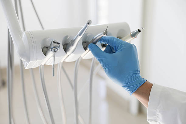 Professional Tooth Extraction technician working in Grove, OK